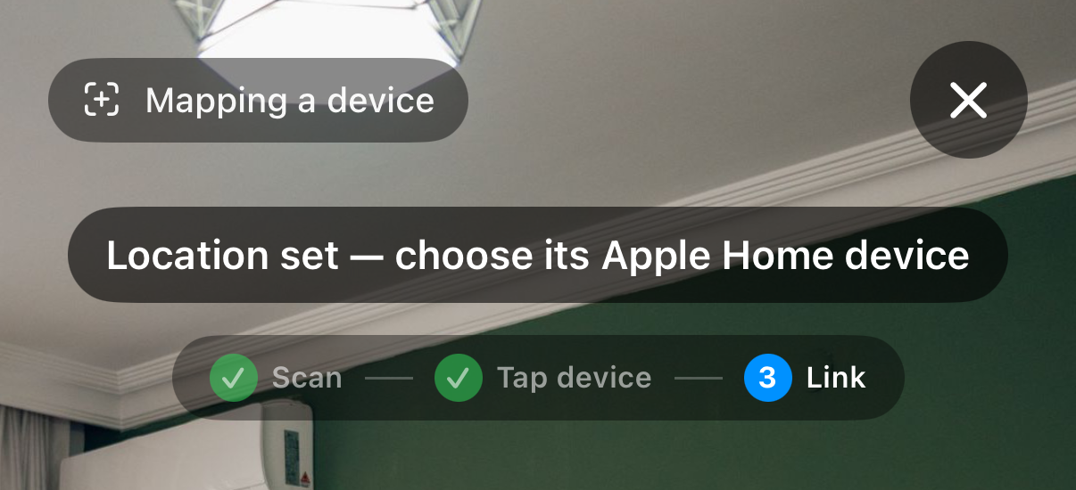 The mapping HUD at step three: Scan and Tap device ticked off, Link active, and the prompt Location set — choose its Apple Home device.